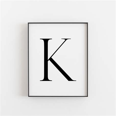 K.